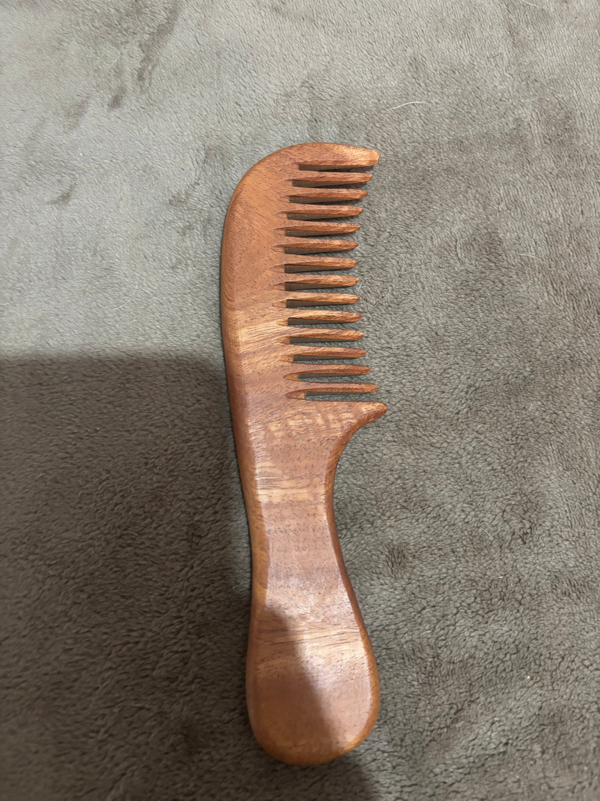 Peigne courbe en bois